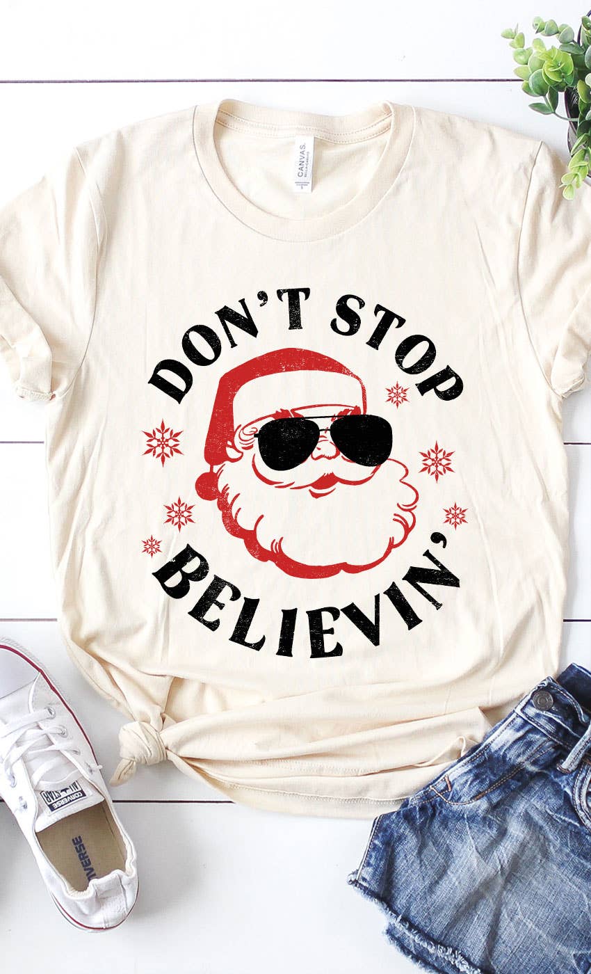 Don't Stop Believin Santa Graphic Tee: CREAM