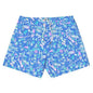 Blue swim shorts with colorful beach-themed pattern on a white background