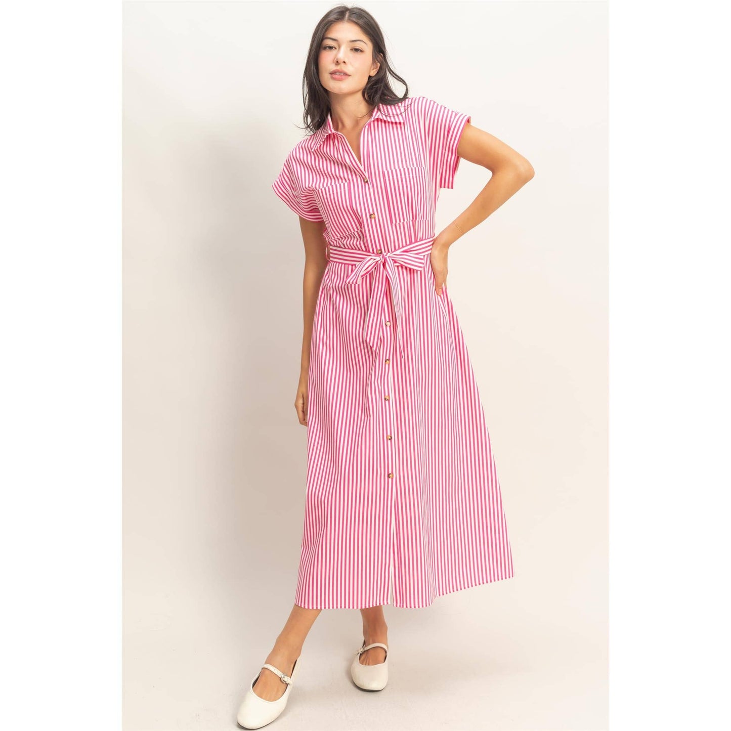 Women’s pink and white striped midi dress with buttons, collar, and adjustable waist tie