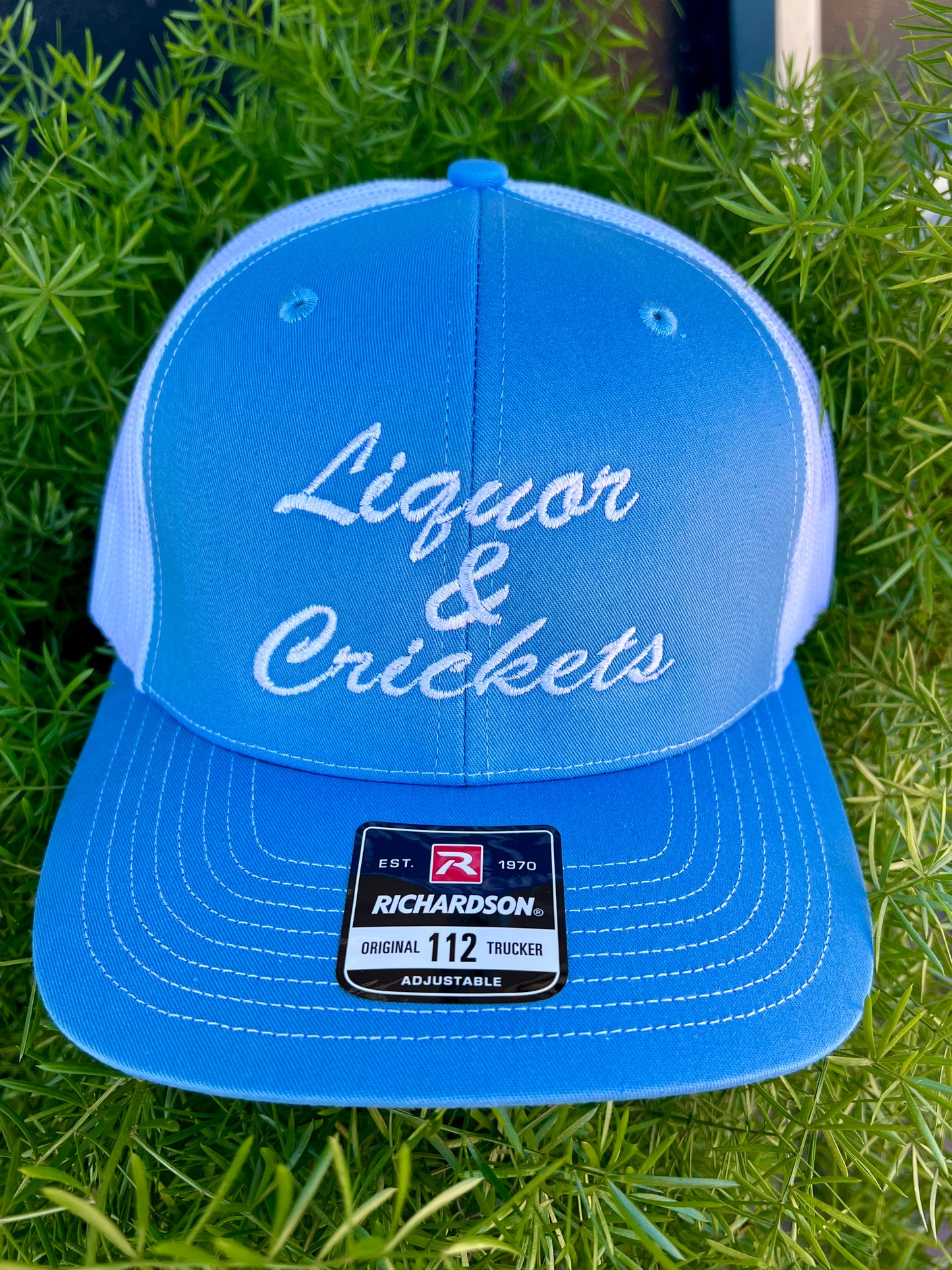 Liquor & Crickets embroidered Carolina Blue white mesh/lettering richardson hat