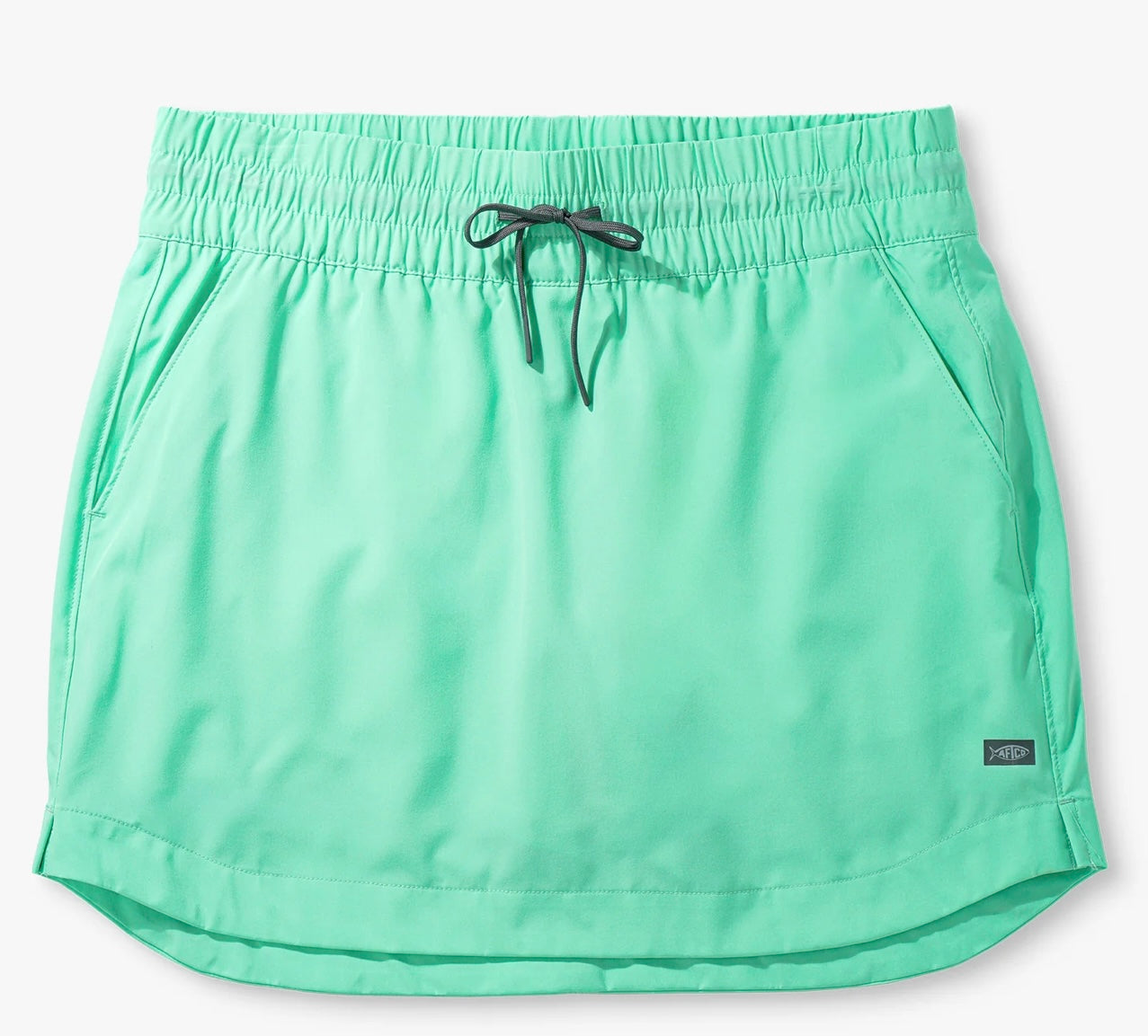 Mint green shorts with a drawstring on a white background