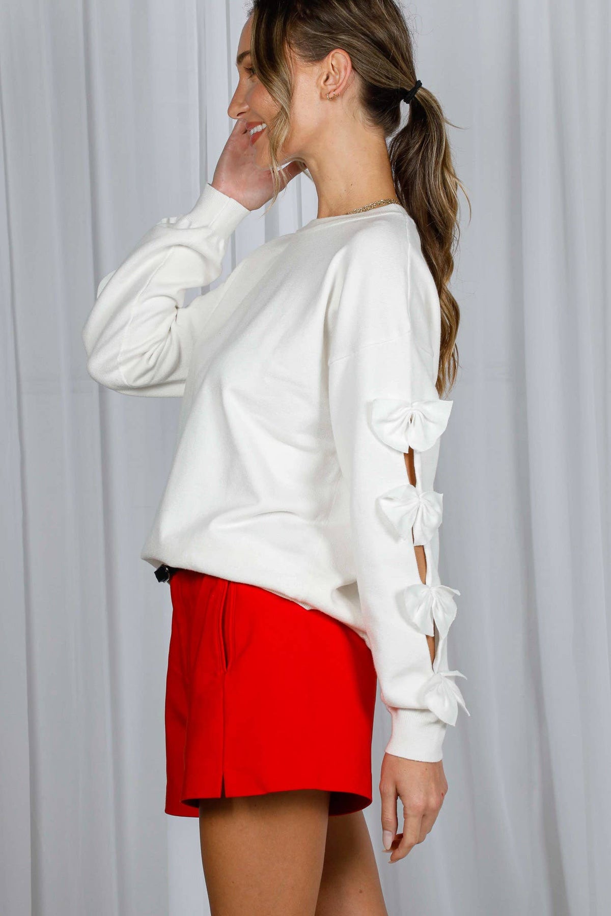 The Bow Down Sweater