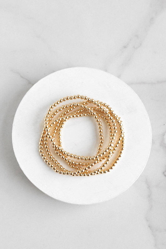 Small ball beads bracelet stack of 5 bracelets Worn Gold